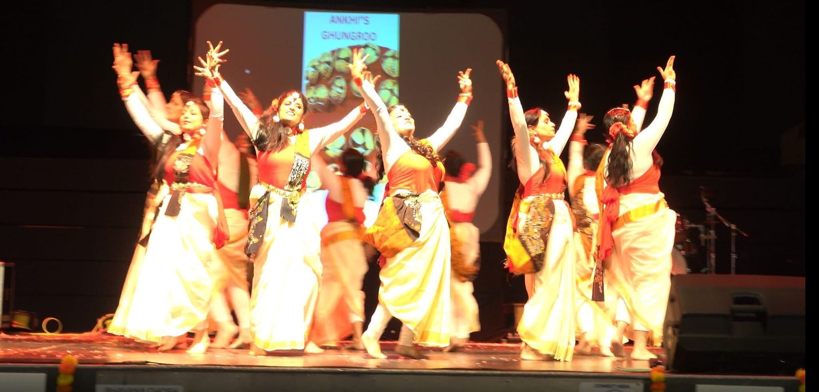 Aankhi and group performing a Bengali dance at the Manchester Boishakh Festival 2026