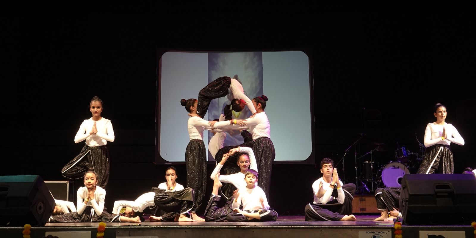 Neha Yogafusion group performing dance yoga at the Manchester Boishakh Festival