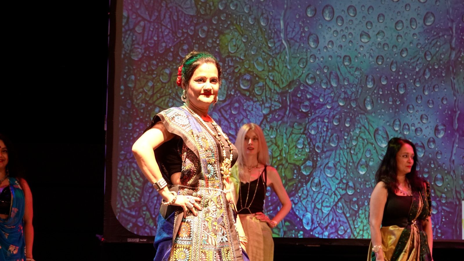 Models in Bengali attire at the Manchester Boishakh Festival fashion show